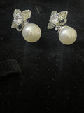 Hanging pearl earrings